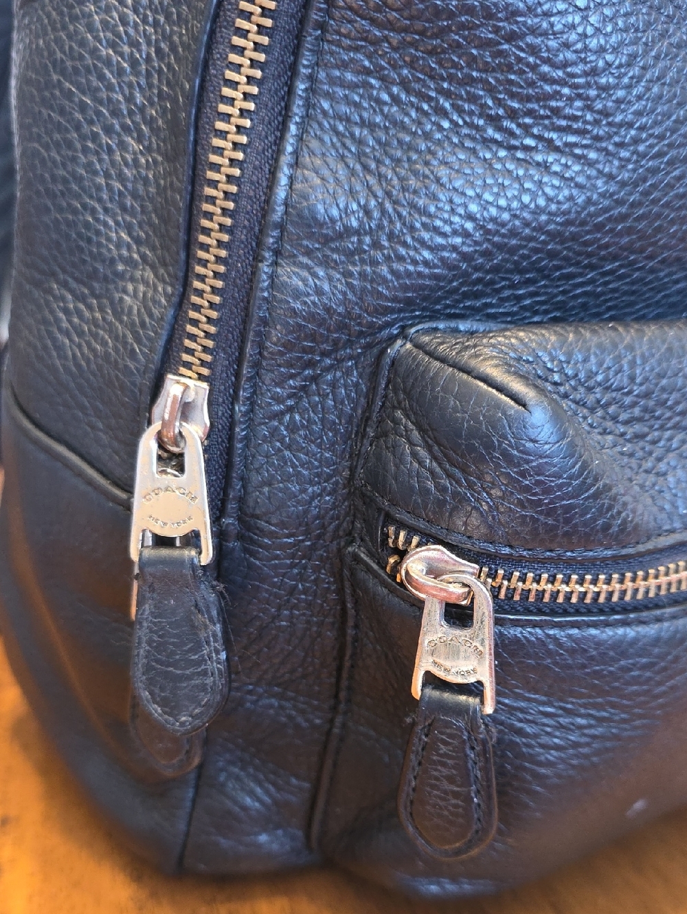 Coach Medium Charlie Backpack in black pebbled leather. - Picture 11 of 16
